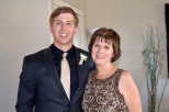 Jared Joerger and his mother pose together before the wedding.